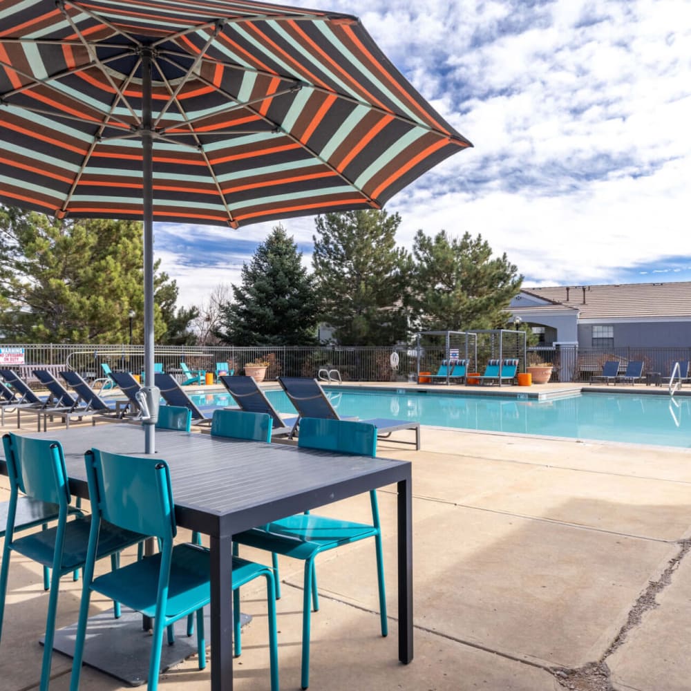 Patio tables and chairs at Artemis at Spring Canyon in Colorado Springs, Colorado