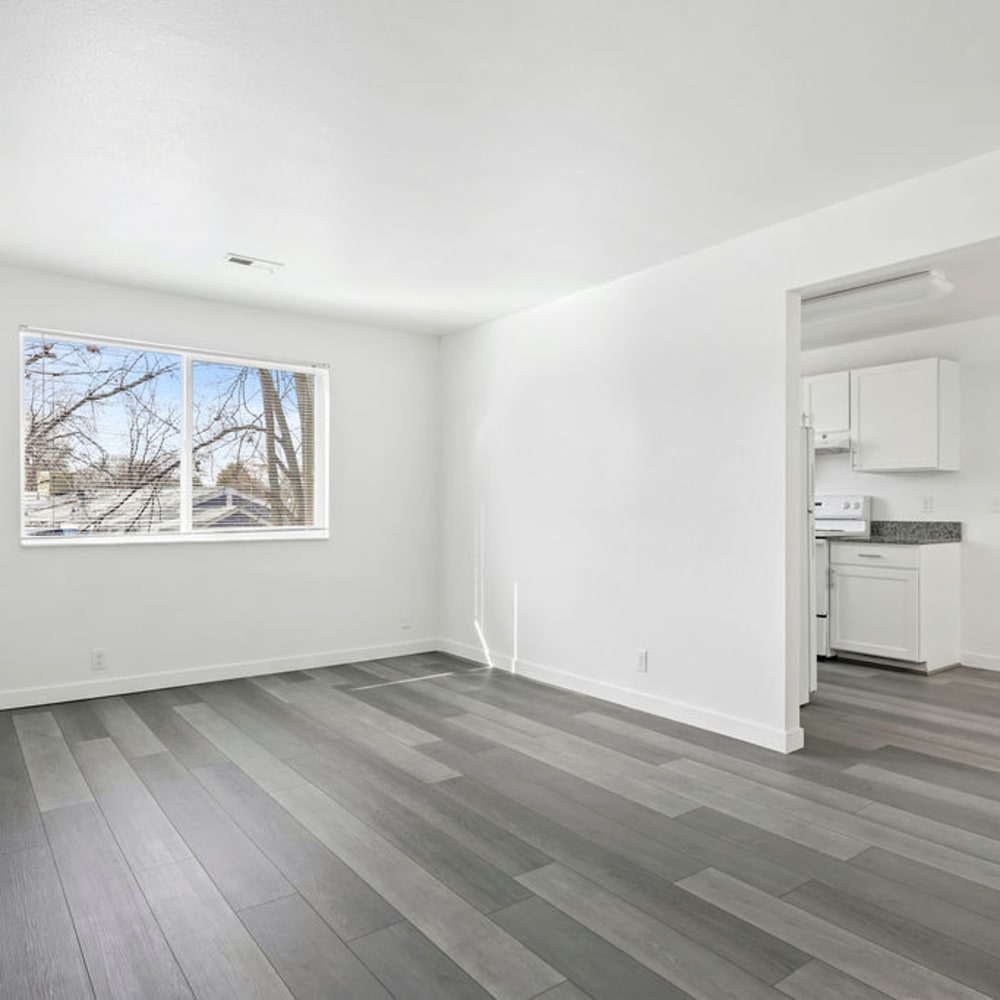 Wood flooring in an apartment living room and kitchen at Mark Twain Apartments in Salt Lake City, Utah