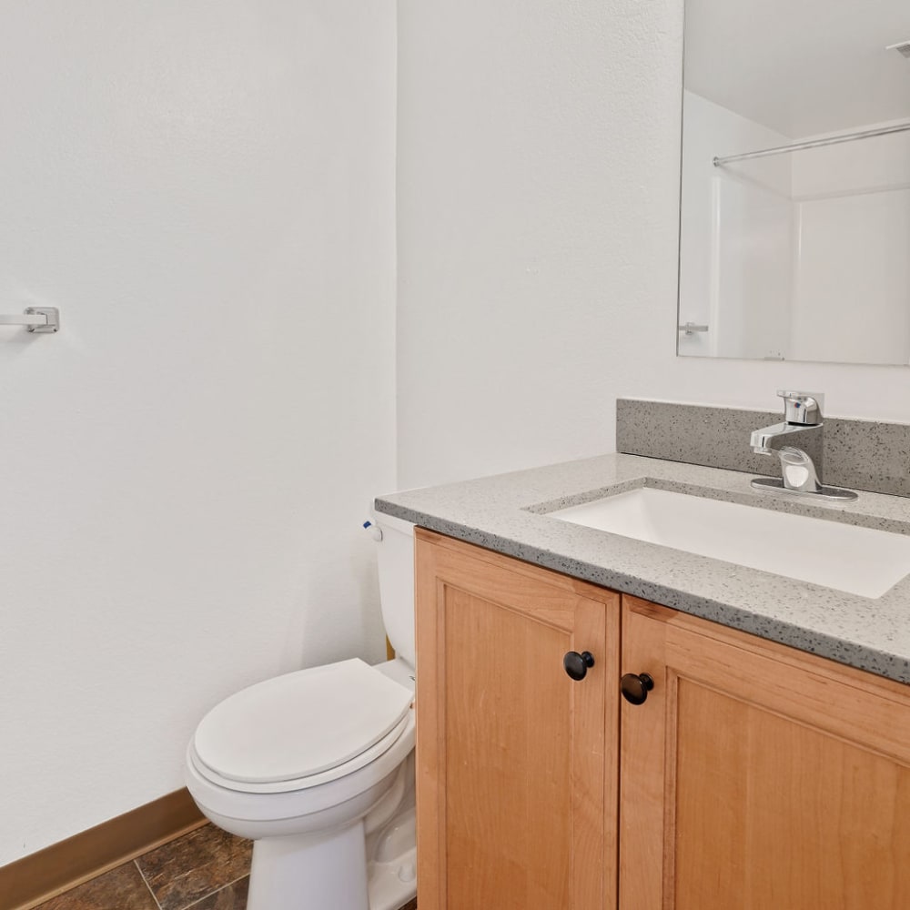 An apartment bathroom with a bathtub at Regency Apartments in Salt Lake City, Utah
