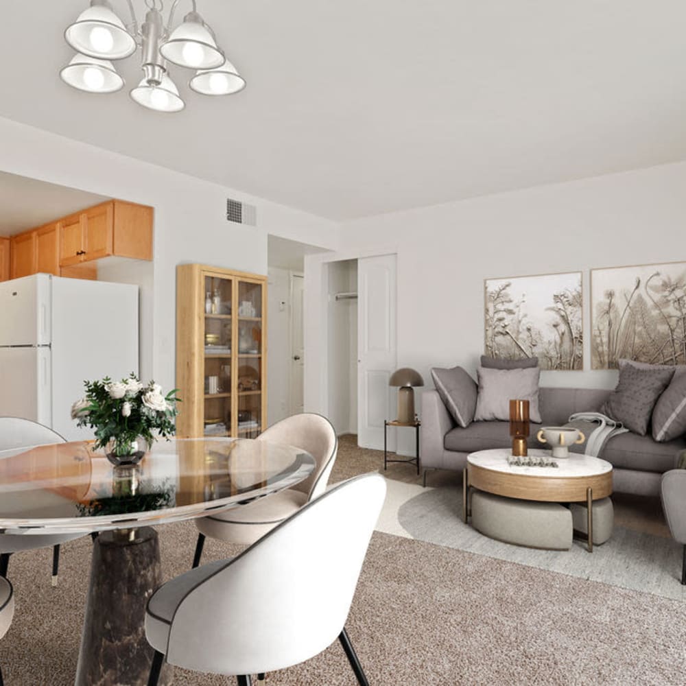 A furnished apartment dining room and living room at Regency Apartments in Salt Lake City, Utah