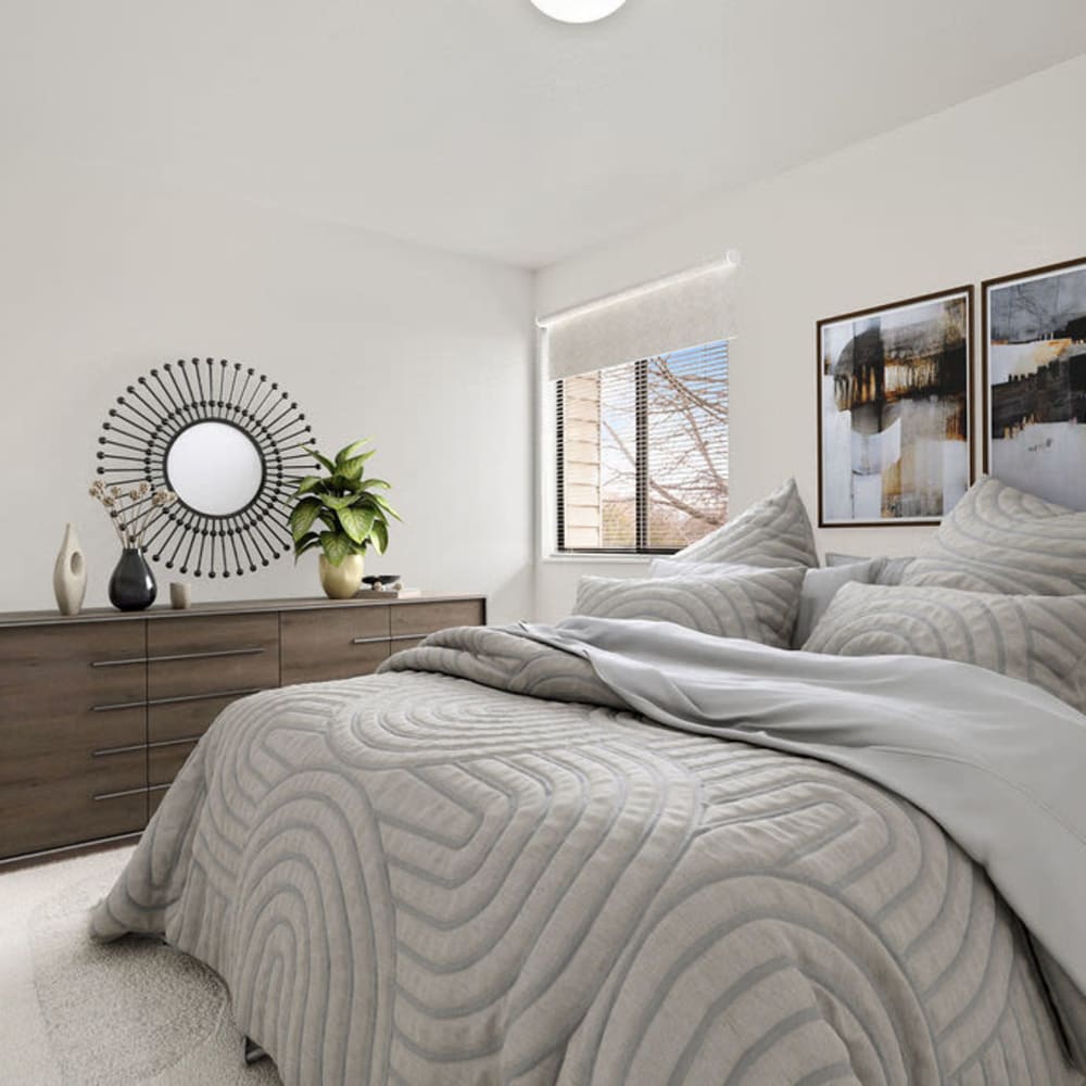 A furnished apartment bedroom at Regency Apartments in Salt Lake City, Utah