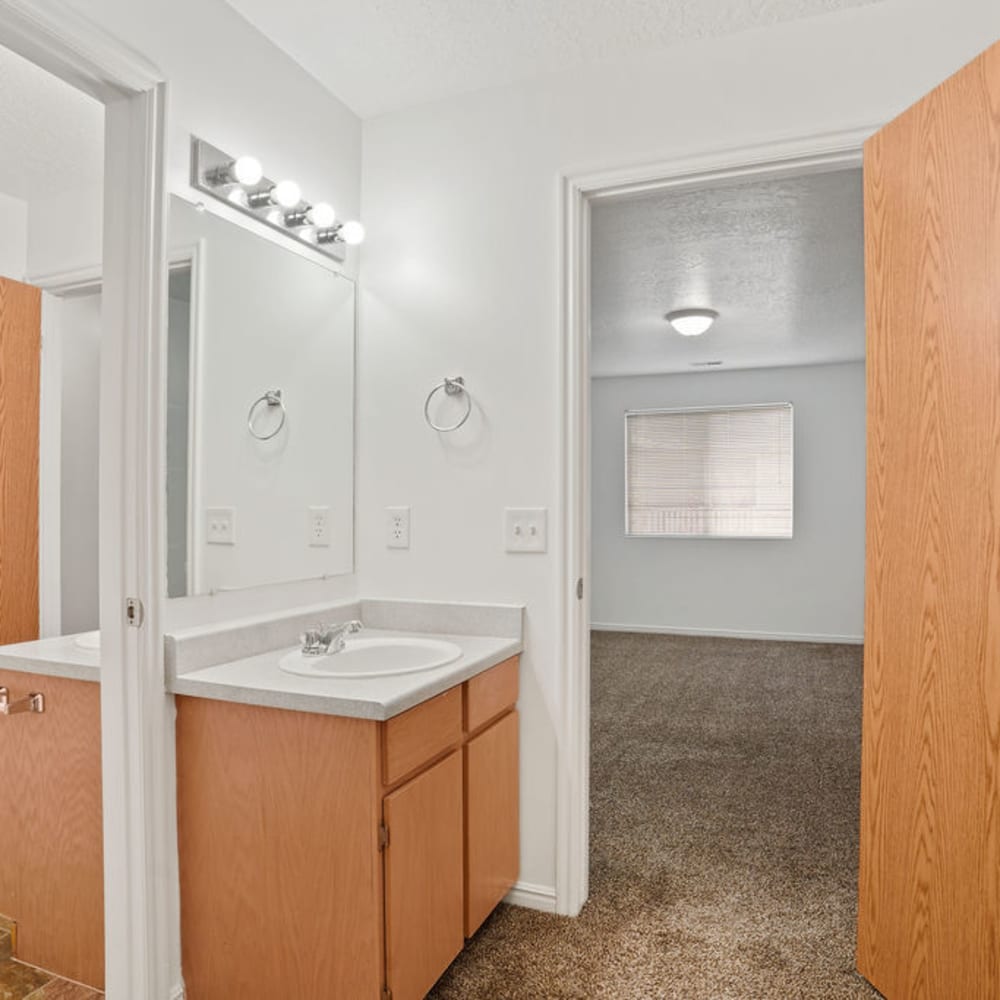 A sink in an apartment bathroom at Stonebridge Apartments in West Jordan, Utah