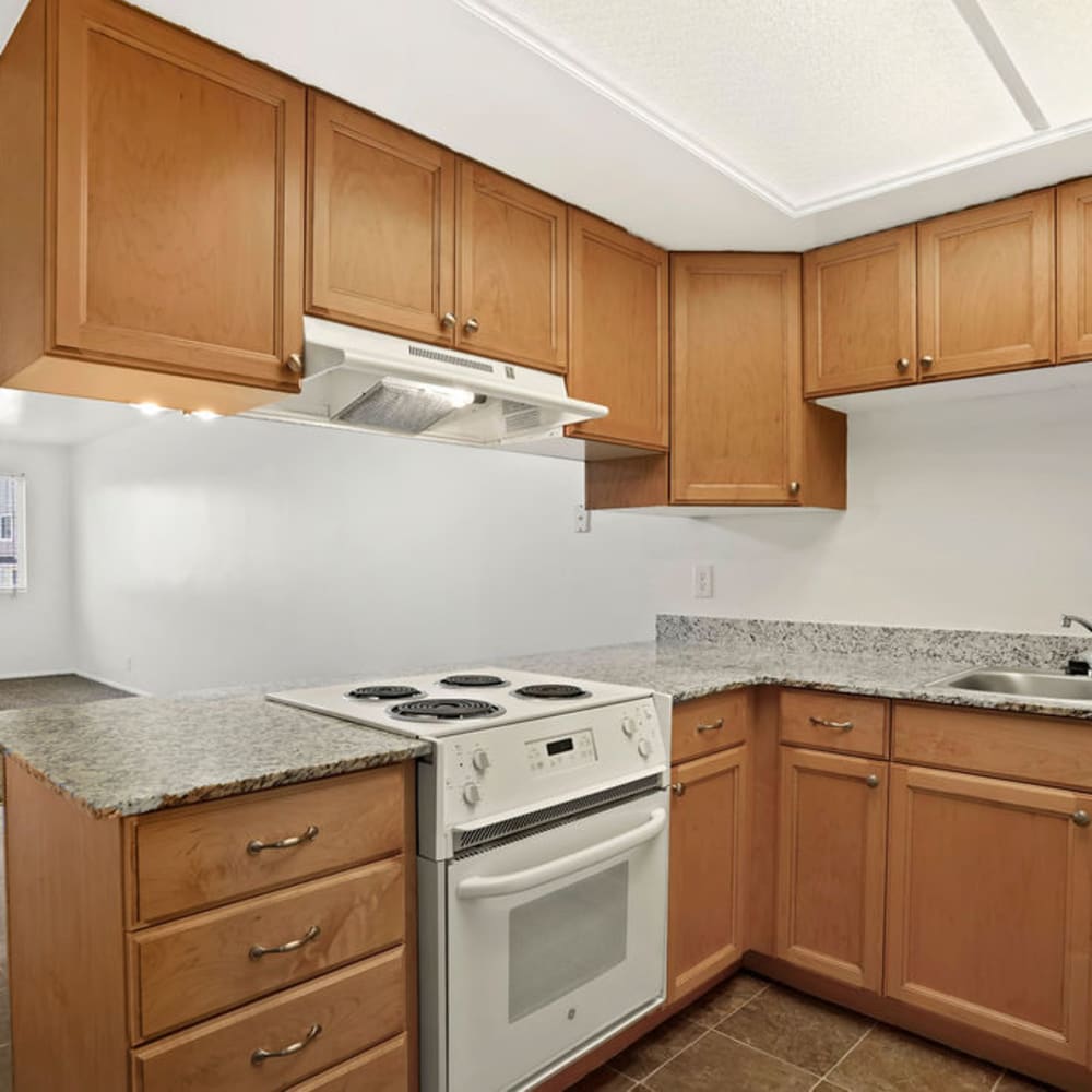 White appliances in an apartment kitchen at Valley Park Apartments in Salt Lake City, Utah