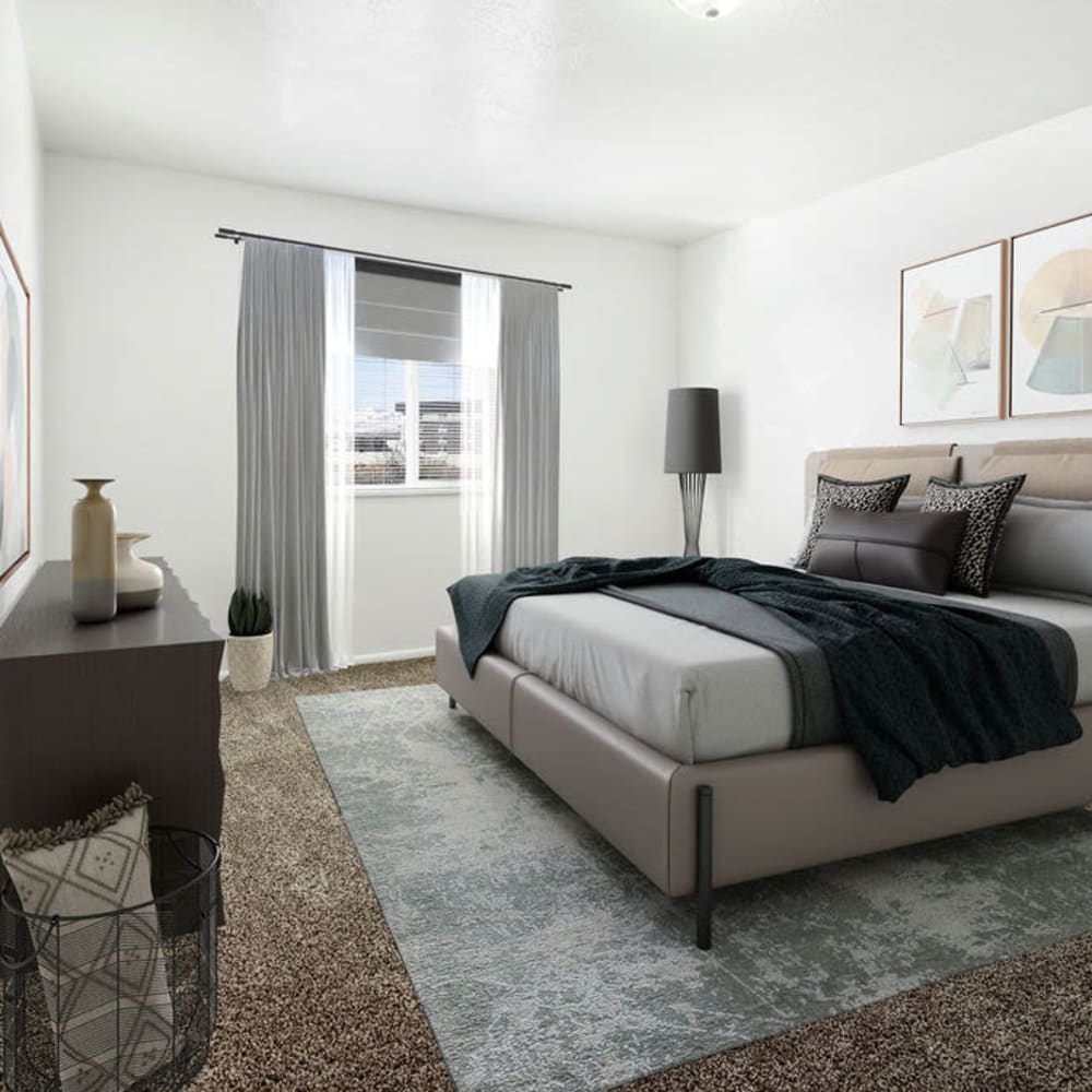 A furnished apartment bedroom at Valley Park Apartments in Salt Lake City, Utah