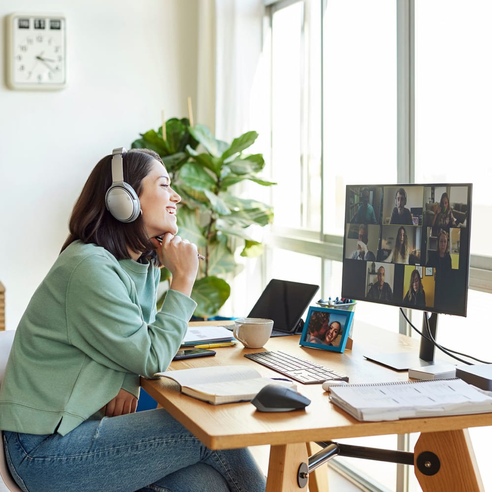 Resident in a virtual meeting working from home at The Village at SoTa in Tacoma, Washington