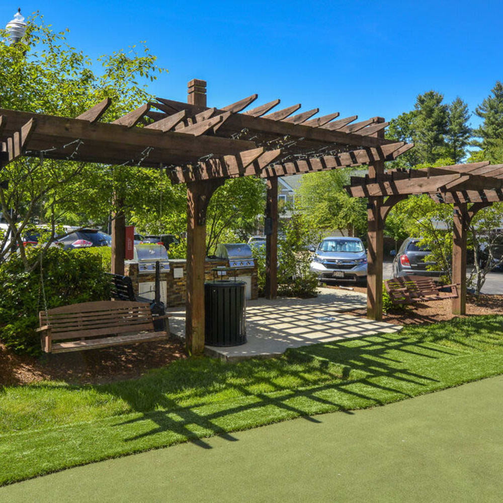 BBQ area at Lux at Stoughton in Stoughton, Massachusetts
