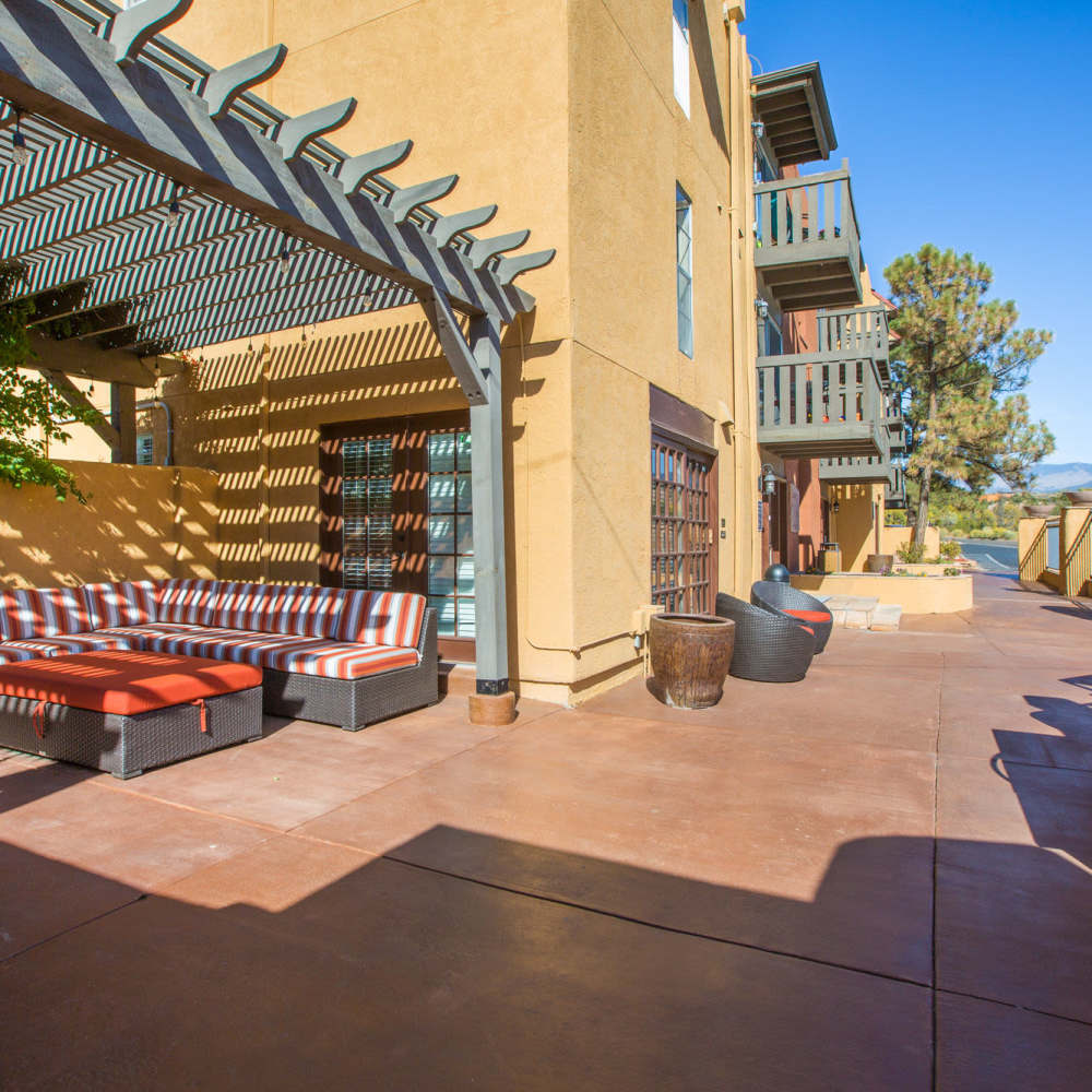 Covered outdoor community gathering area at The Mica in Santa Fe, New Mexico
