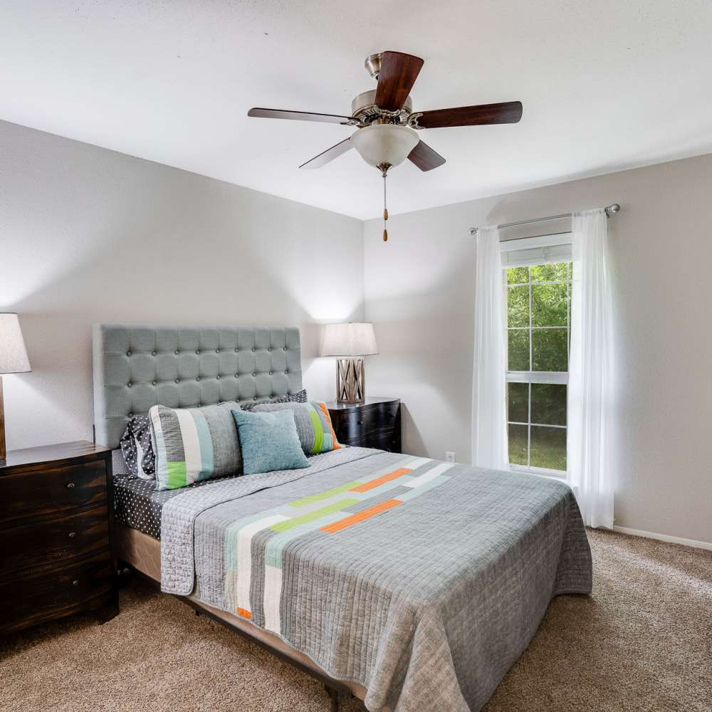Bedroom with a ceiling fan at Ridgemont at Stringers Ridge in Chattanooga, Tennessee