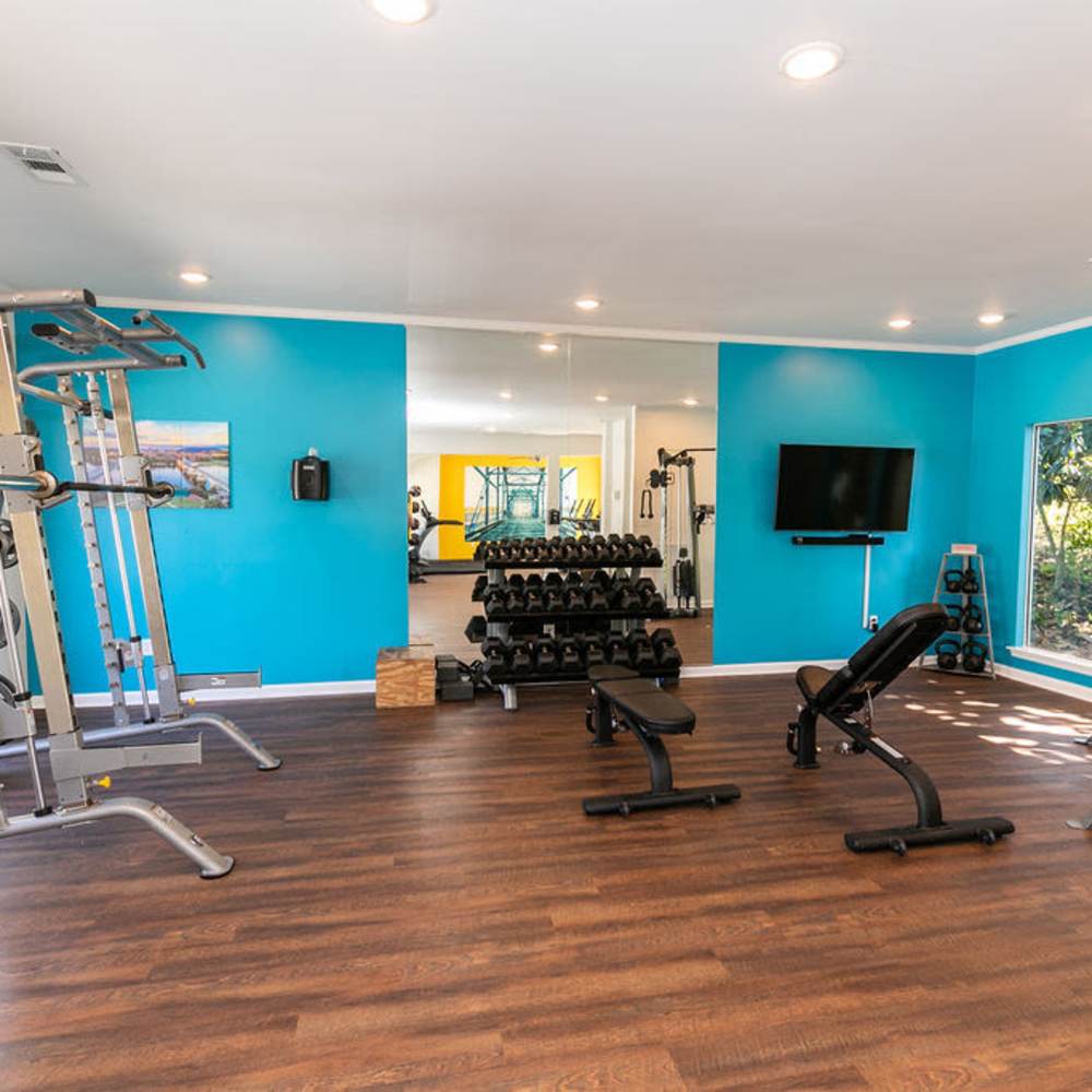 Fitness center with exercise machines at Ridgemont at Stringers Ridge in Chattanooga, Tennessee