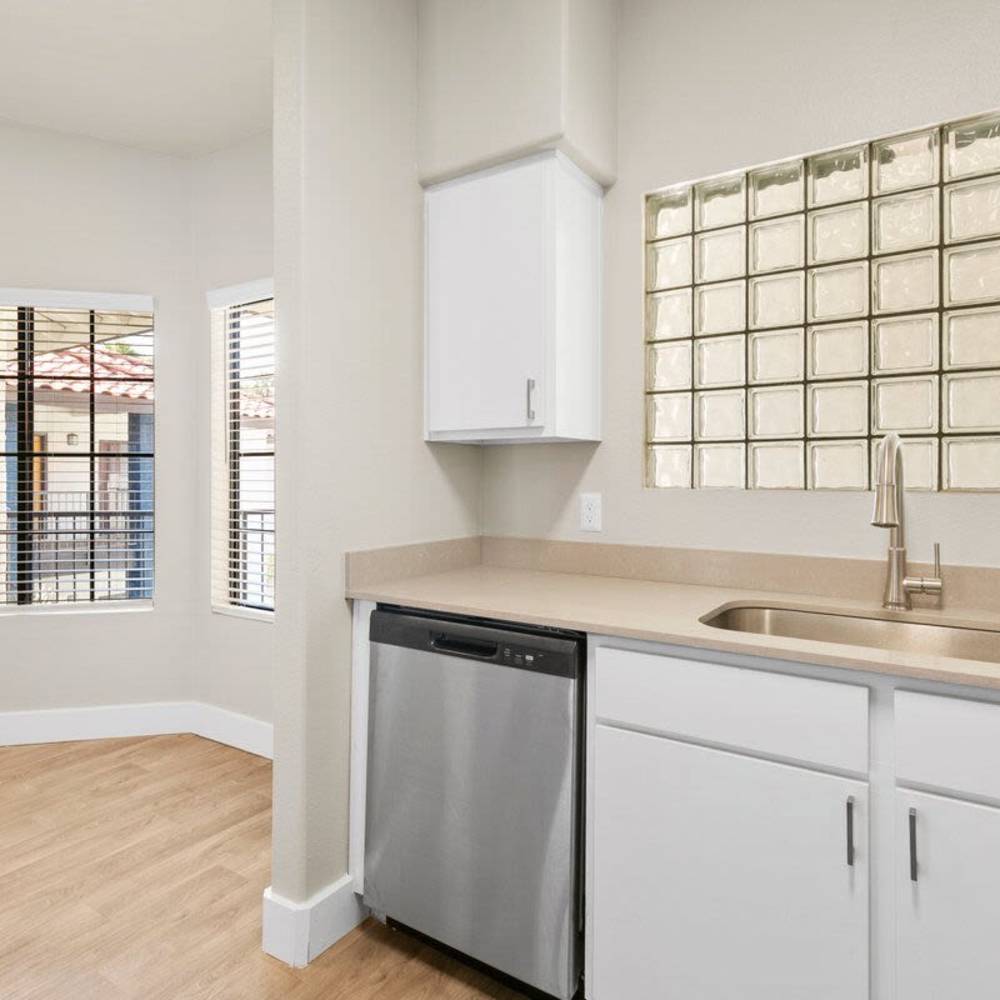 Kitchen with a dishwasher at Fountain Palms in Peoria, Arizona