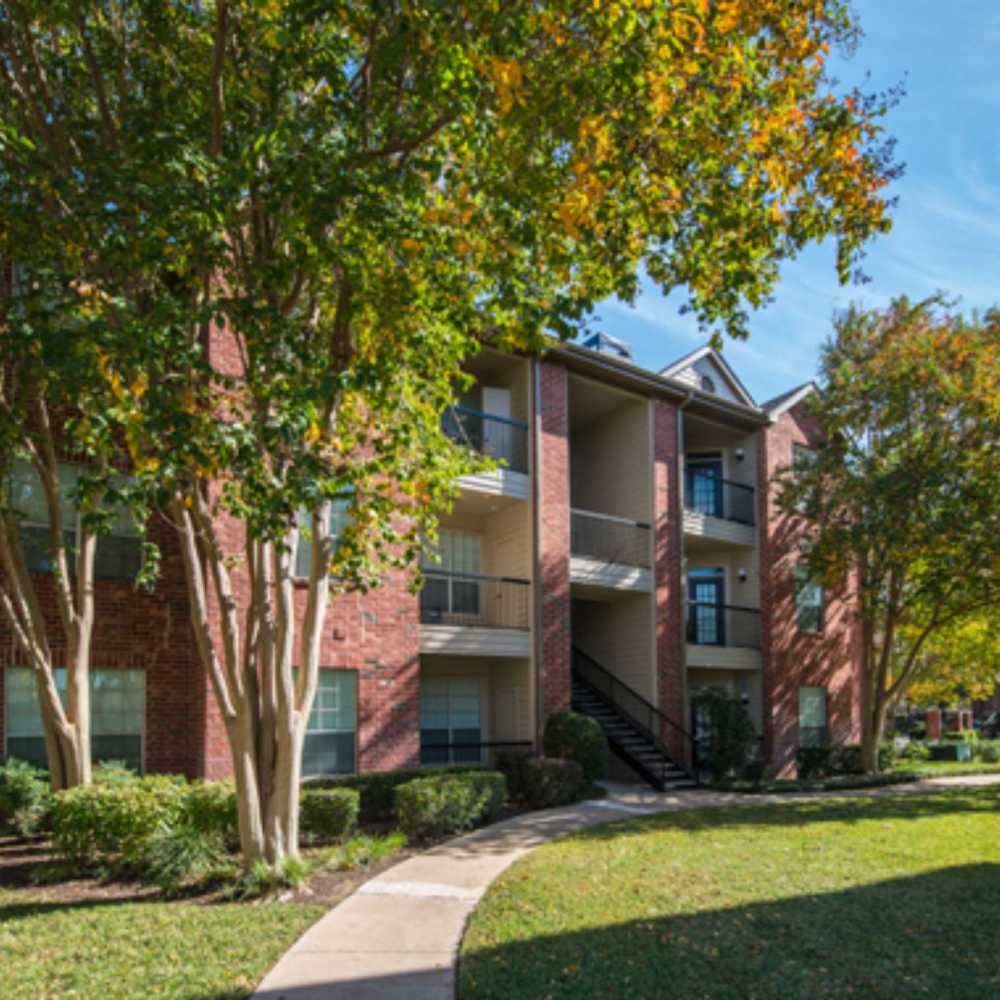 Exterior apartment building view at Woodland Park in Houston, Texas