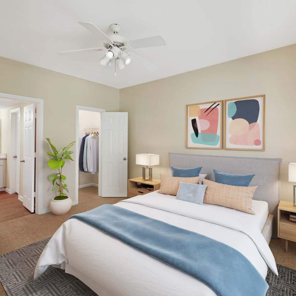 Bedroom with a ceiling fan at Oak Crest in Houston, Texas