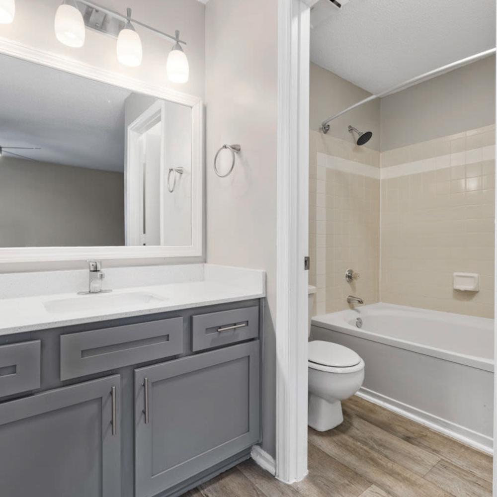 Bathroom with great lighting at Concord Apartments in Raleigh, North Carolina