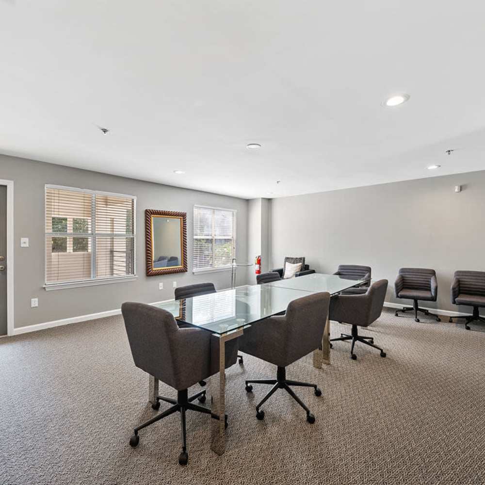Clubhouse with meeting table at Concord Apartments in Raleigh, North Carolina