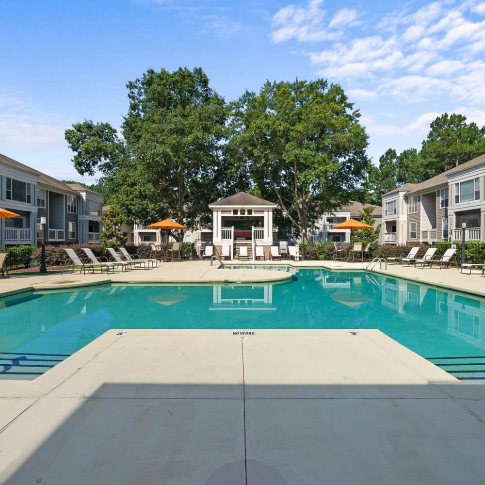 Lounge poolside at Concord Apartments in Raleigh, North Carolina