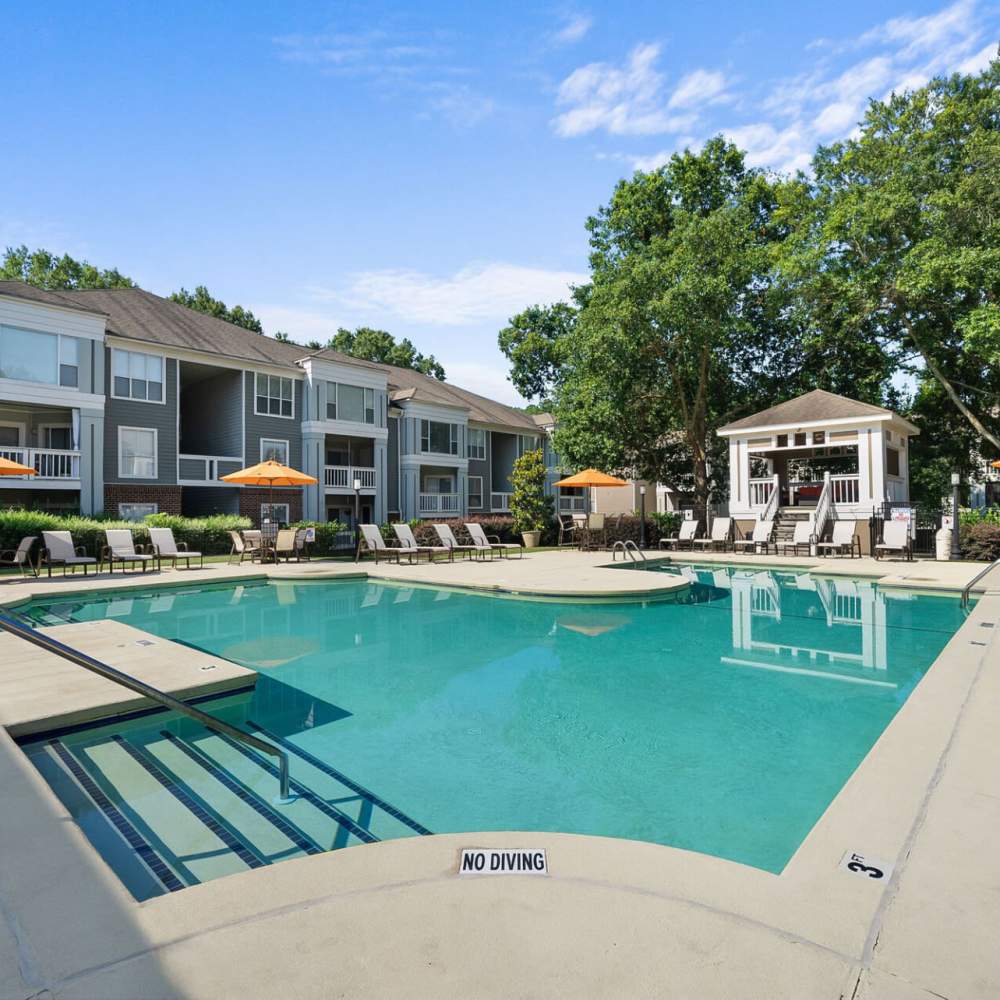Swimming pool with a cabana at Concord Apartments in Raleigh, North Carolina