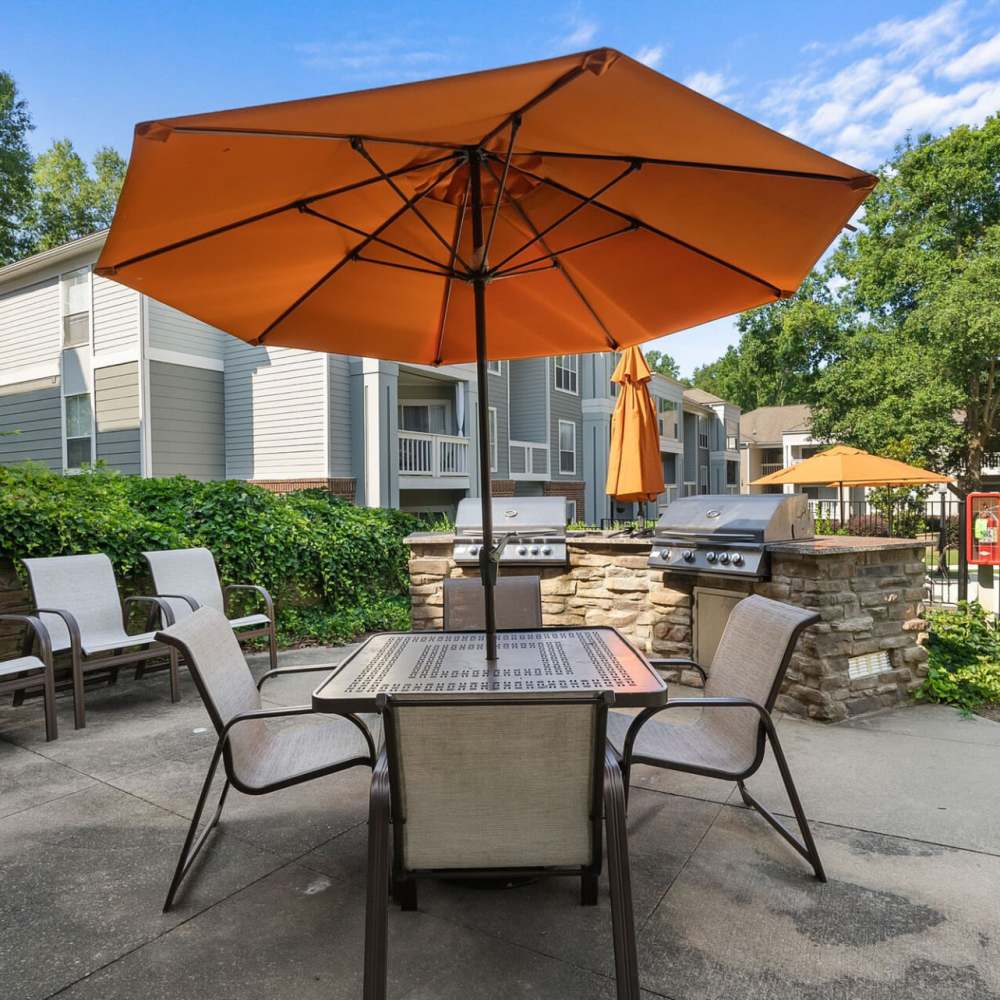 Patio table and chairs at Concord Apartments in Raleigh, North Carolina