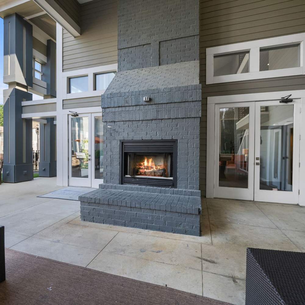 Clubhouse with outdoor firepit at Concord Apartments in Raleigh, North Carolina