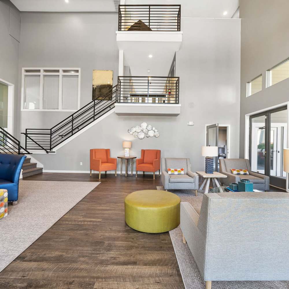 Clubhouse with wood-style flooring at Concord Apartments in Raleigh, North Carolina