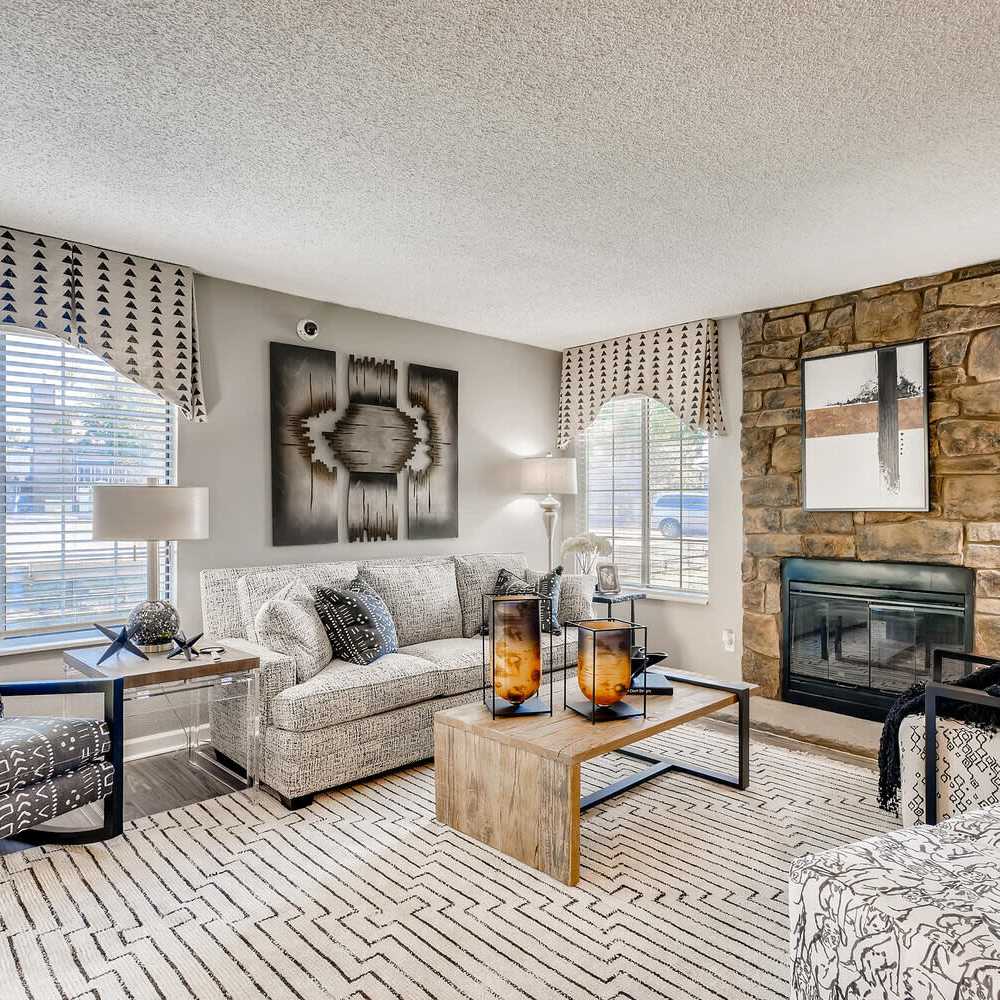 Living space with a fireplace at Loretto Heights in Denver, Colorado