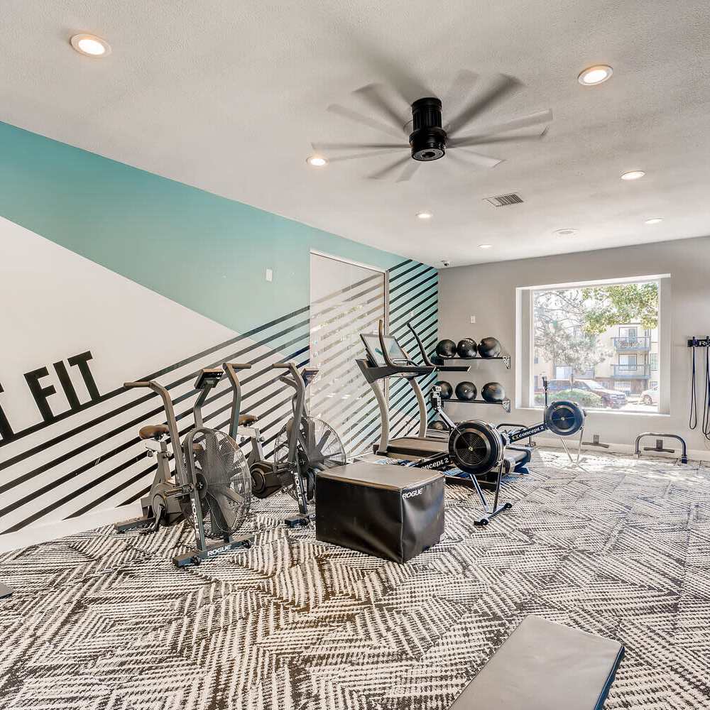 Fitness center with free-weights at Loretto Heights in Denver, Colorado