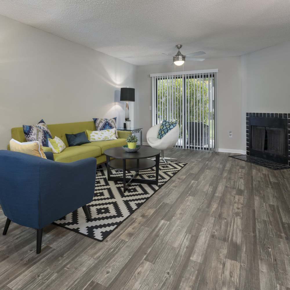 Living space with access to the patio or balcony at Four Lakes at Clearwater in Clearwater, Florida