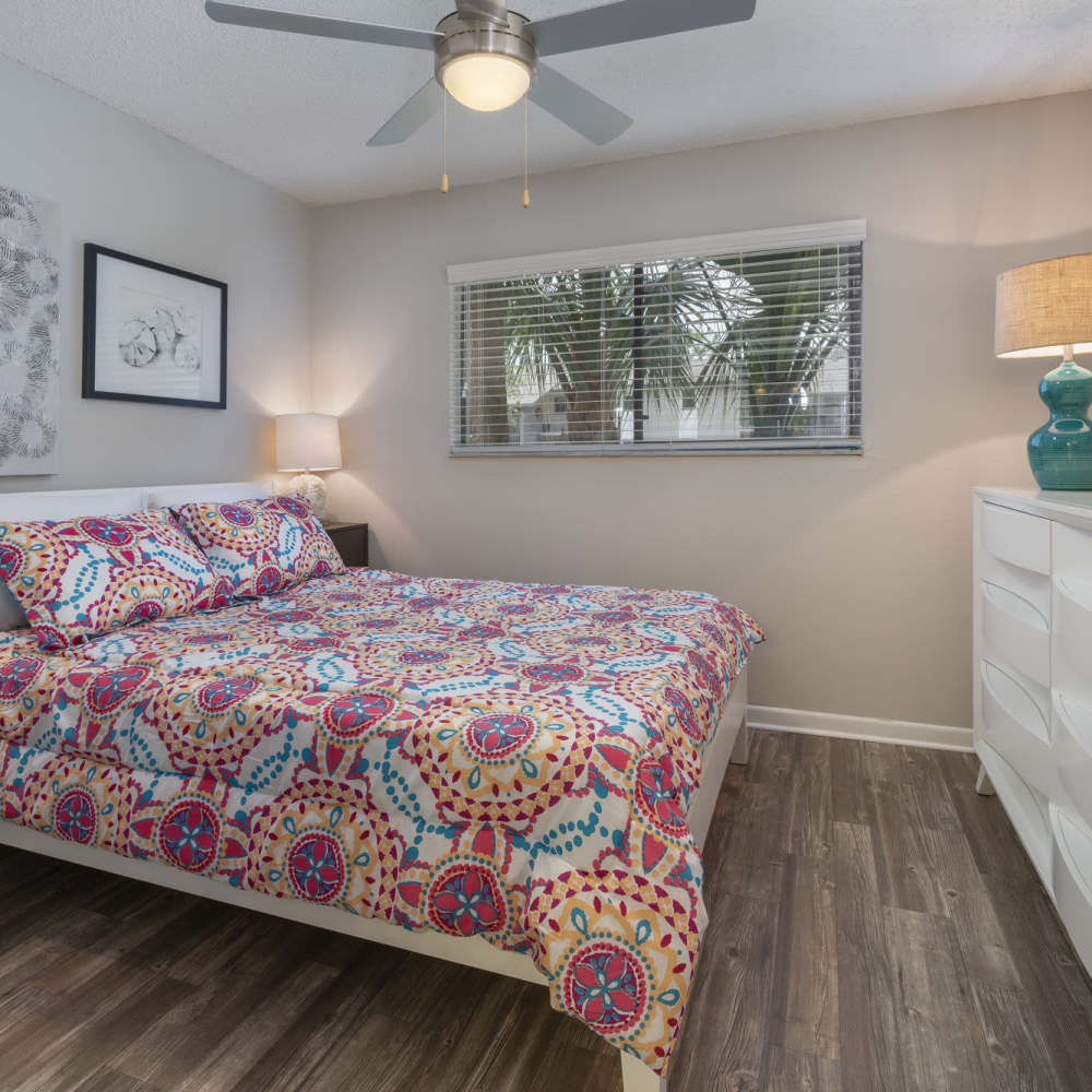 Bedroom with a ceiling fan at Four Lakes at Clearwater in Clearwater, Florida