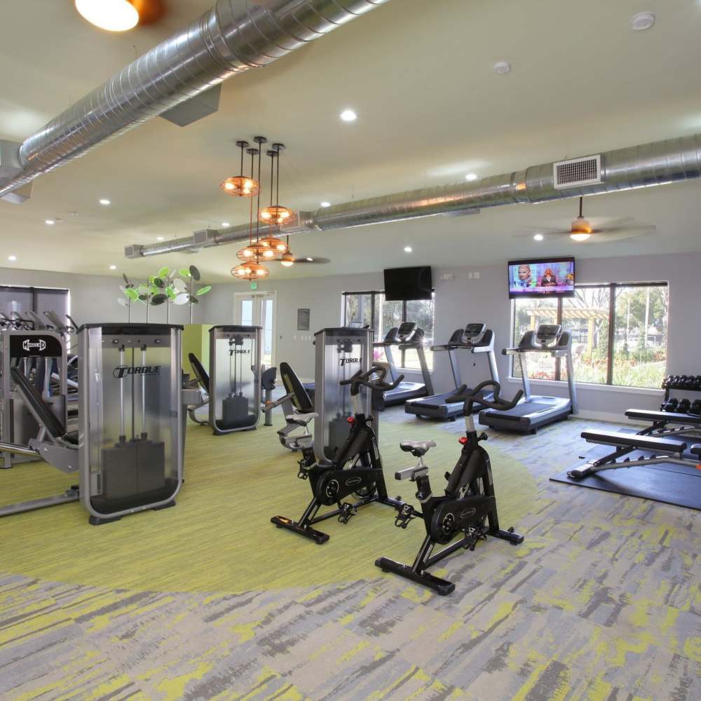 Fitness center with exercise bikes at Four Lakes at Clearwater in Clearwater, Florida
