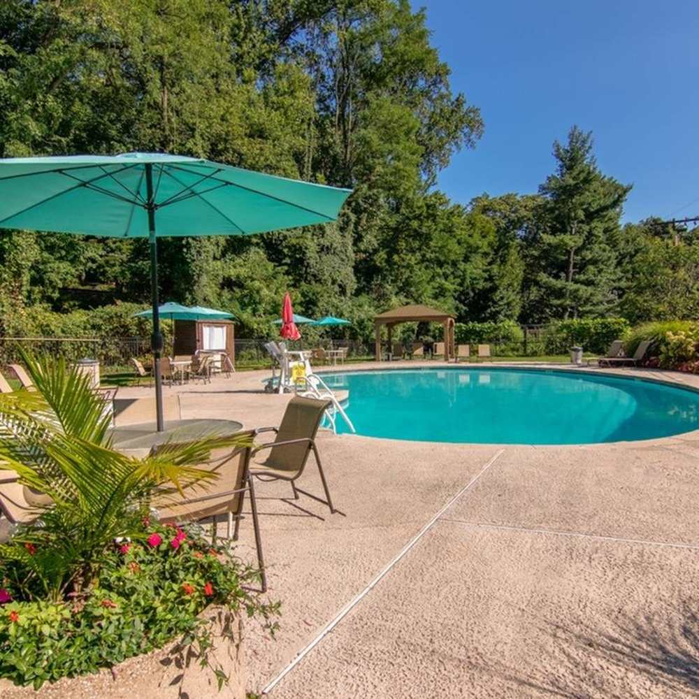 Swimming pool with shaded seating 806 Short Hills Terrace in Short Hills, New Jersey