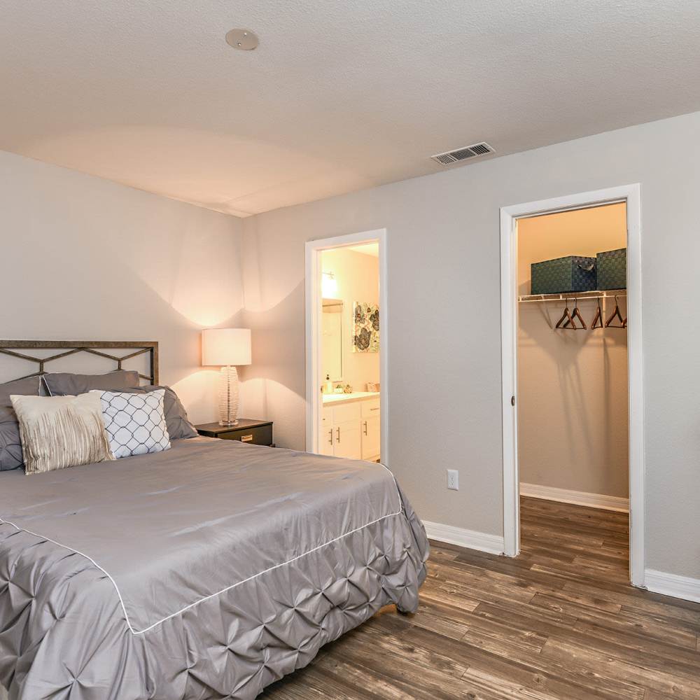 Bedroom with large closets at Fourteen01 Apartments in Orlando, Florida