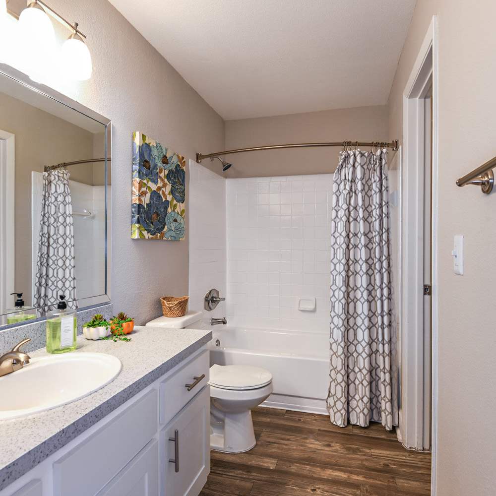 Bathroom with great lighting at Fourteen01 Apartments in Orlando, Florida