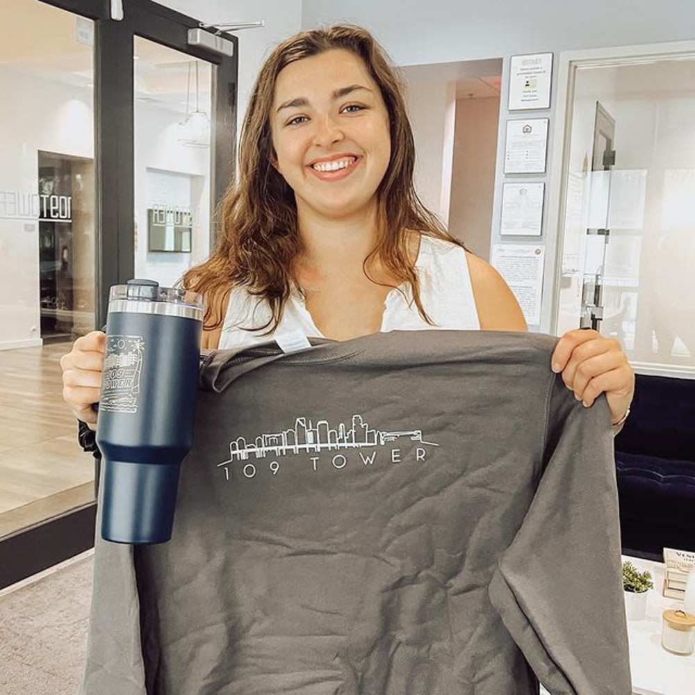 Resident with school merch at 109 Tower in Miami, Florida