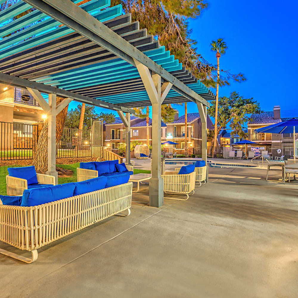 Covered patio seating by the pool at The Marlow in Henderson, Nevada