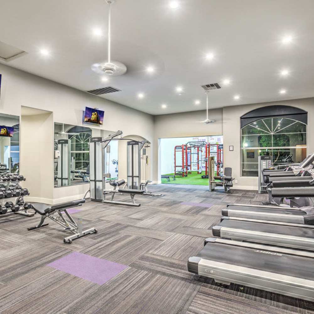 Fitness center with exercise machines at Calypso Apartments in Las Vegas, Nevada