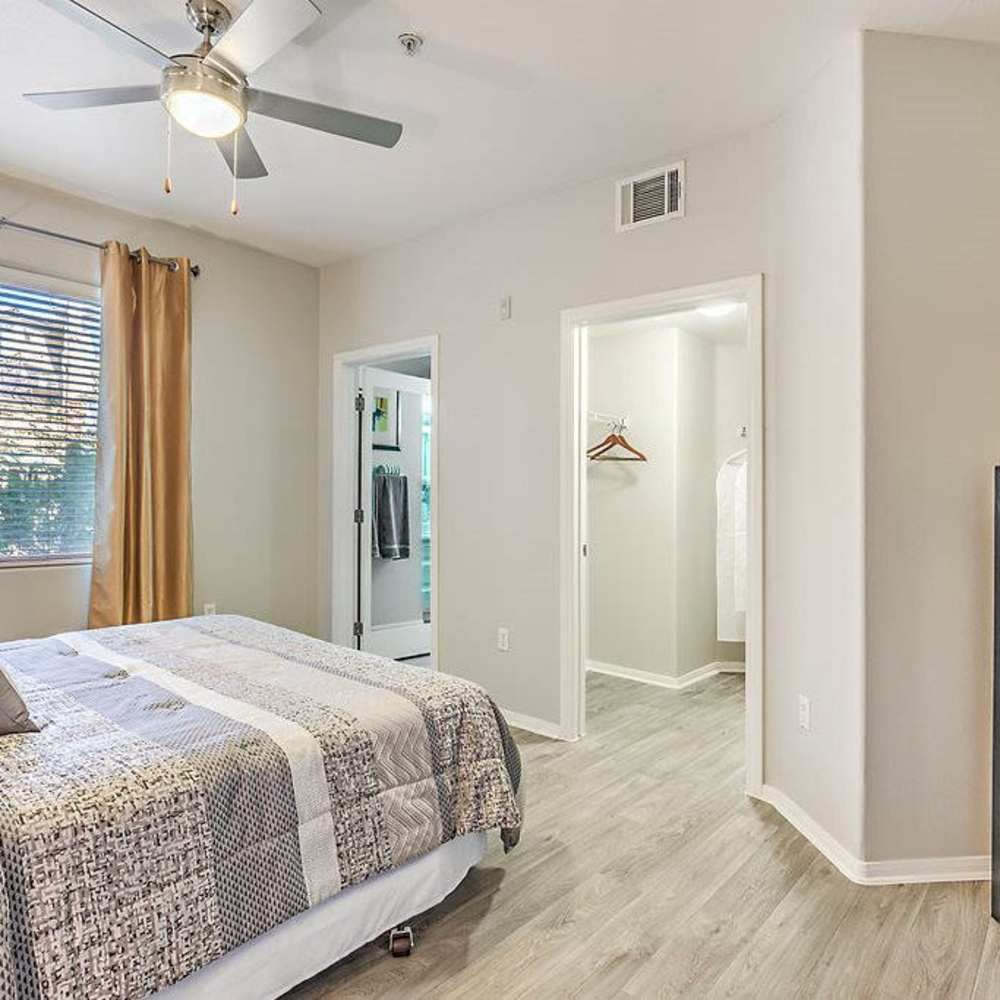 Bedroom with a ceiling fan at Luminous in Las Vegas, Nevada
