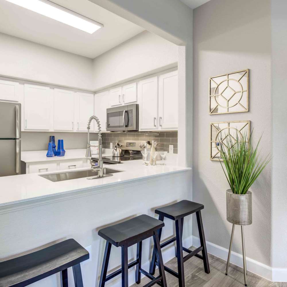 Kitchen with a breakfast bar at Aviata in Las Vegas, Nevada