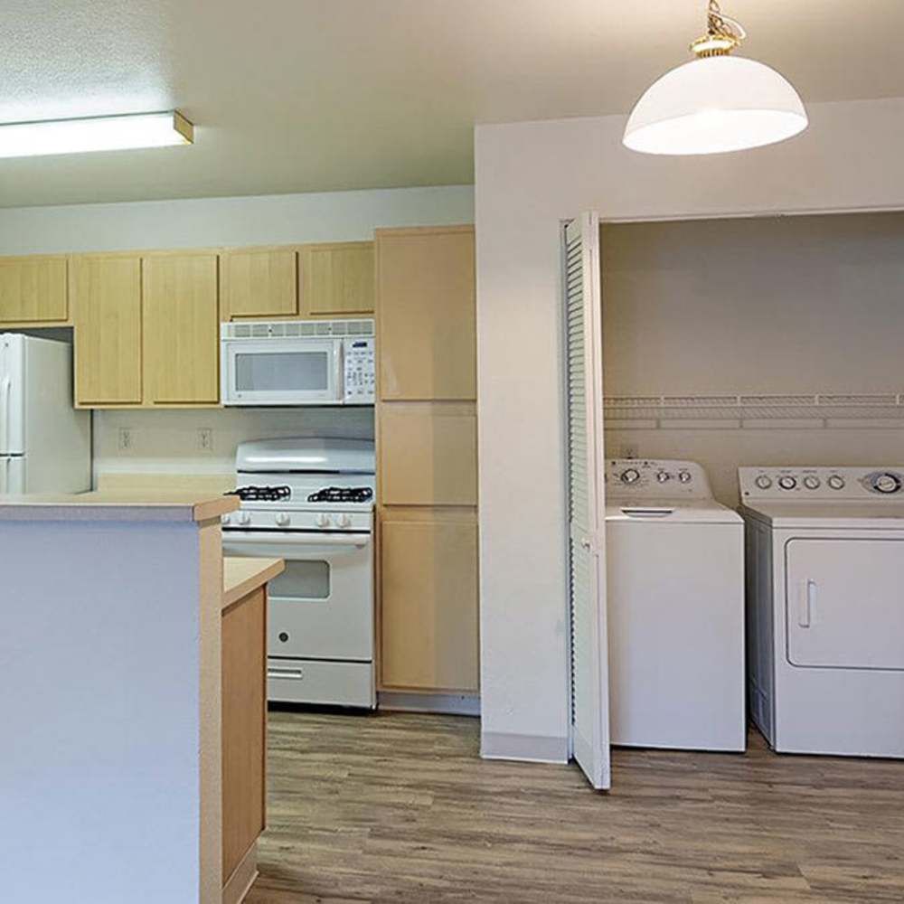 Kitchen and In unit laundry at Whittell Pointe I and II in Reno, Nevada