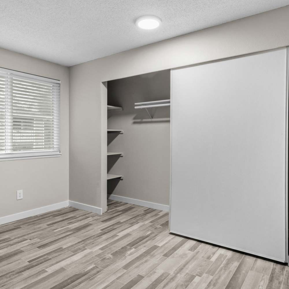 Bedroom with large closets at Spinnaker Apartments in Des Moines, Washington