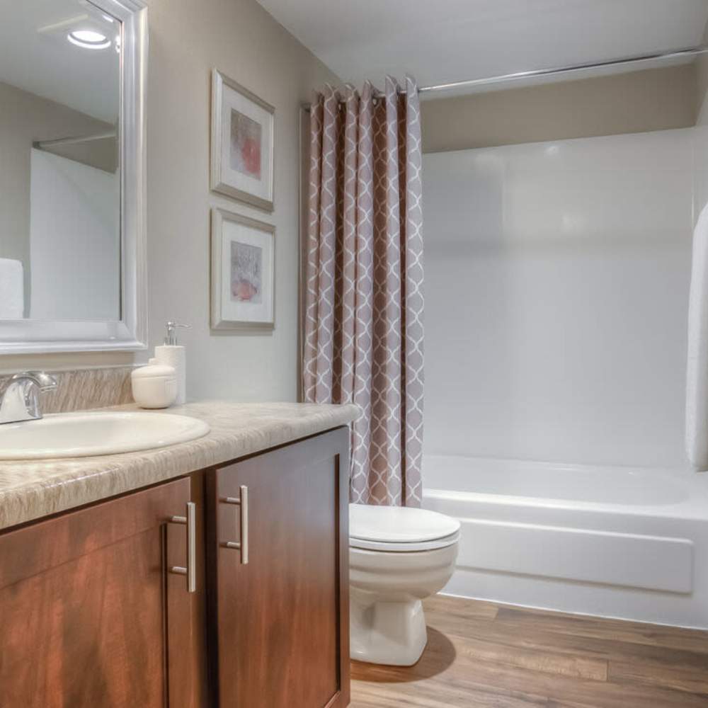 Bathroom with great lighting at Spinnaker Apartments in Des Moines, Washington