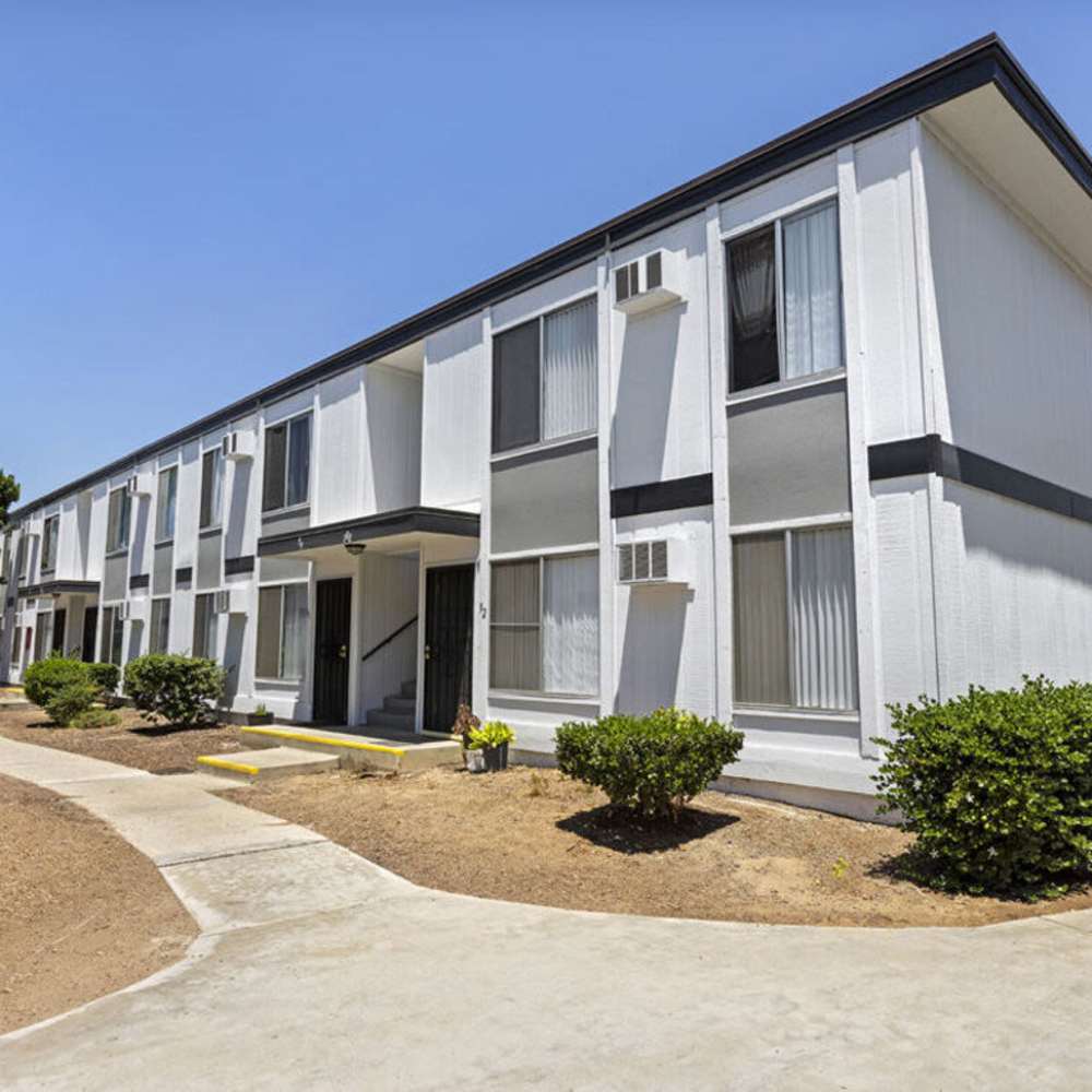 Apartment building with landscaping at ALTA in El Cajon, California