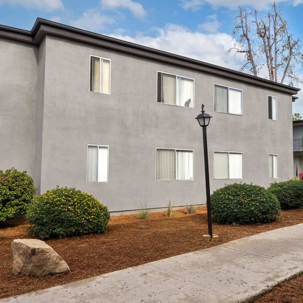 Apartment building with walkway at Terre at 989 Peach in El Cajon, California