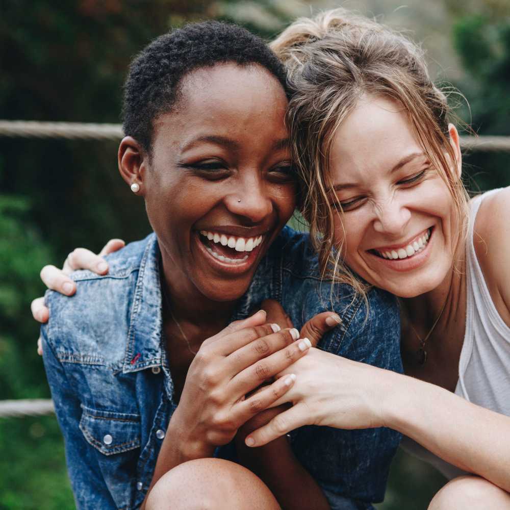 Two residents hugging at Birchwood Grove in Davenport, Iowa