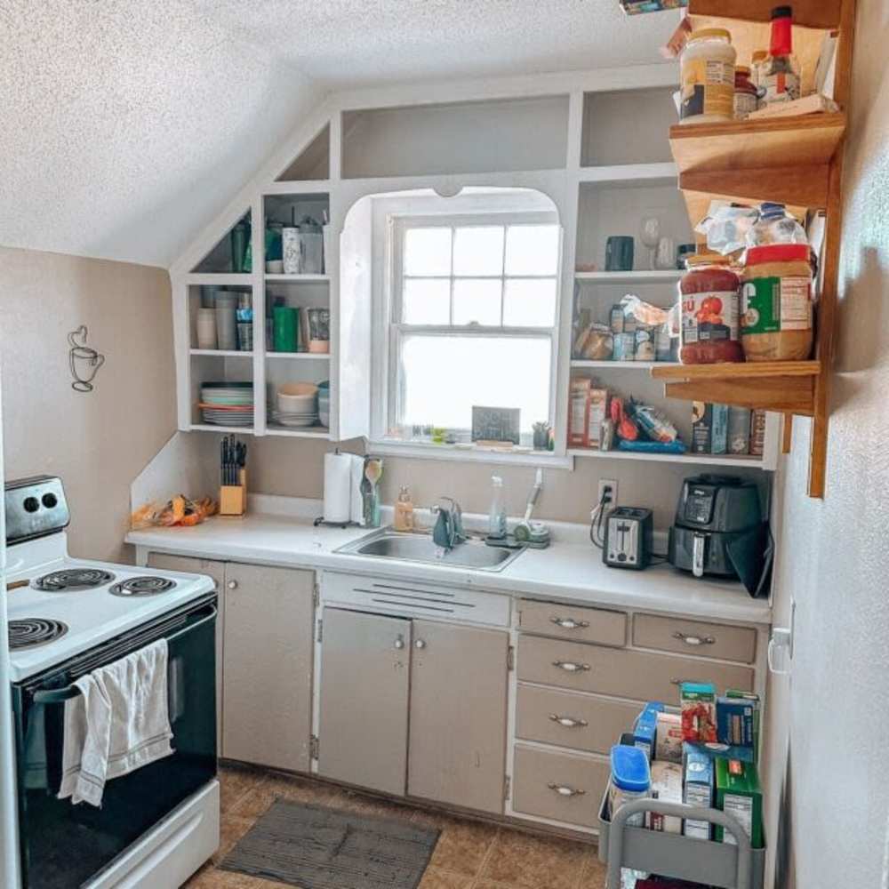 Kitchen with plenty of built-in shelving at RentMSU in Mankato, Minnesota