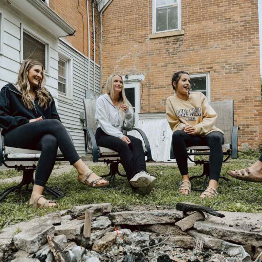 Residents sitting around a campfire at RentMSU in Mankato, Minnesota