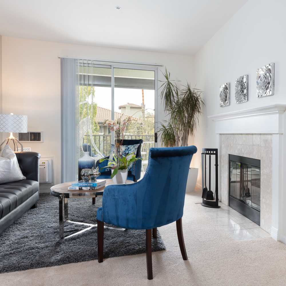 Living space with blue accents Villa Torino in San Jose, California