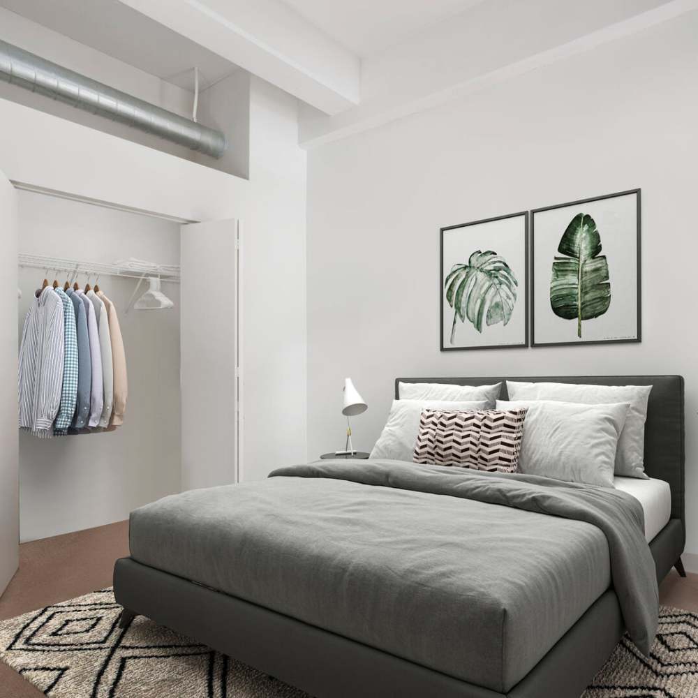 bedroom with closet at Grand Lowry Lofts in Denver, Colorado