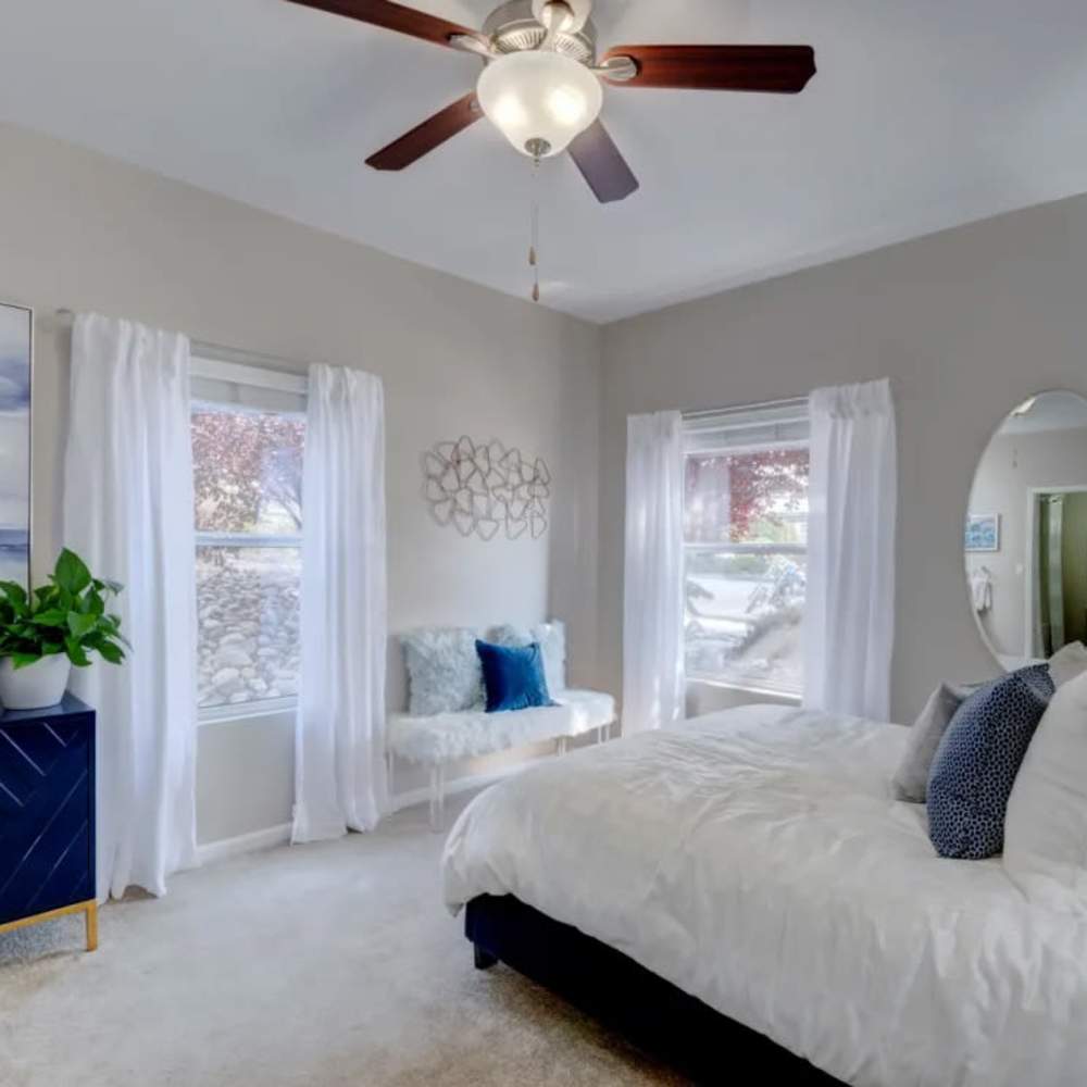 Bedroom with large windows at Canyon Vista in Sparks, Nevada