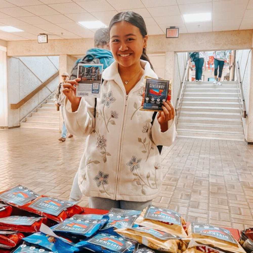 Resident with giveaways and snacks at The Landing at Fayetteville in Fayetteville, Arkansas