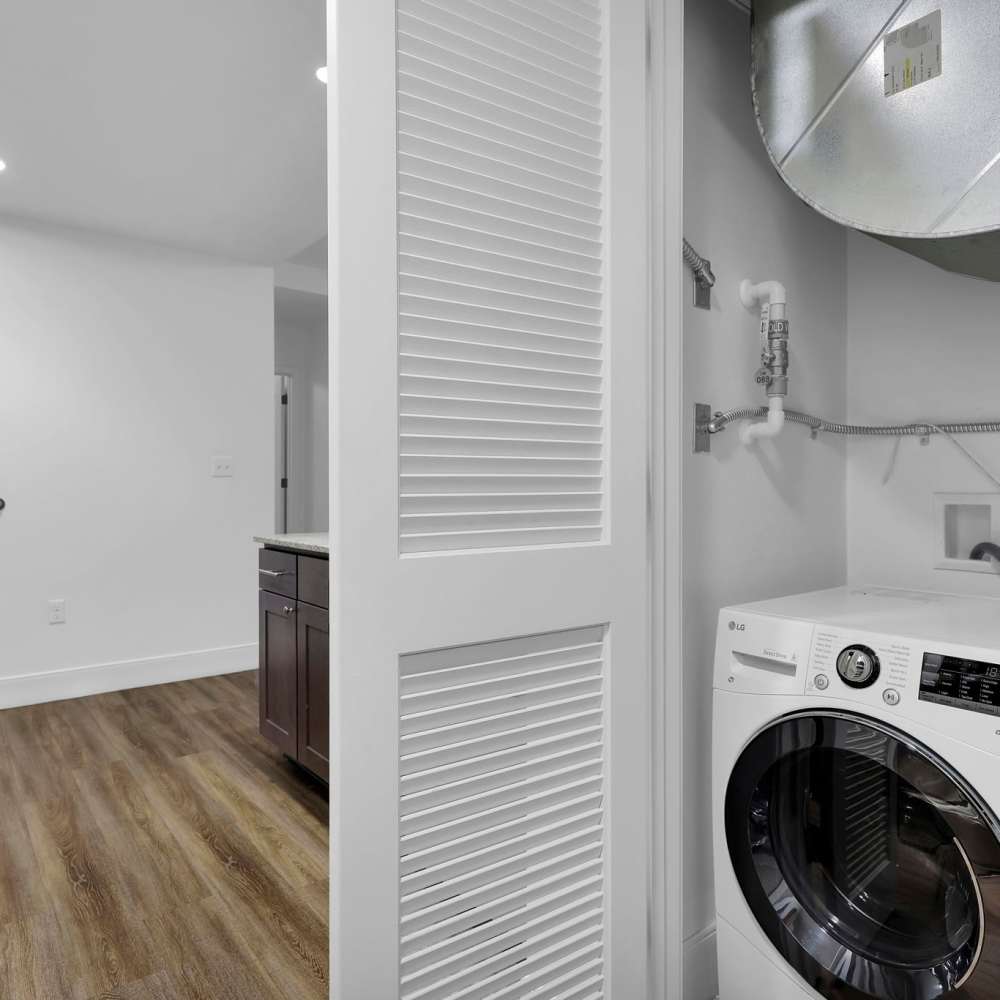 In-home washer and dryer with easy access at The Residences at Barnett in Jacksonville, Florida