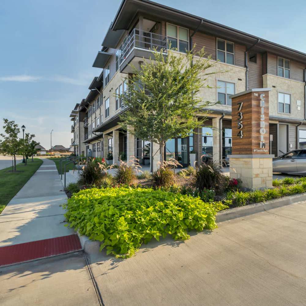 Exterior view of the apartments at Chisholm at Tavolo Park in Fort Worth, Texas